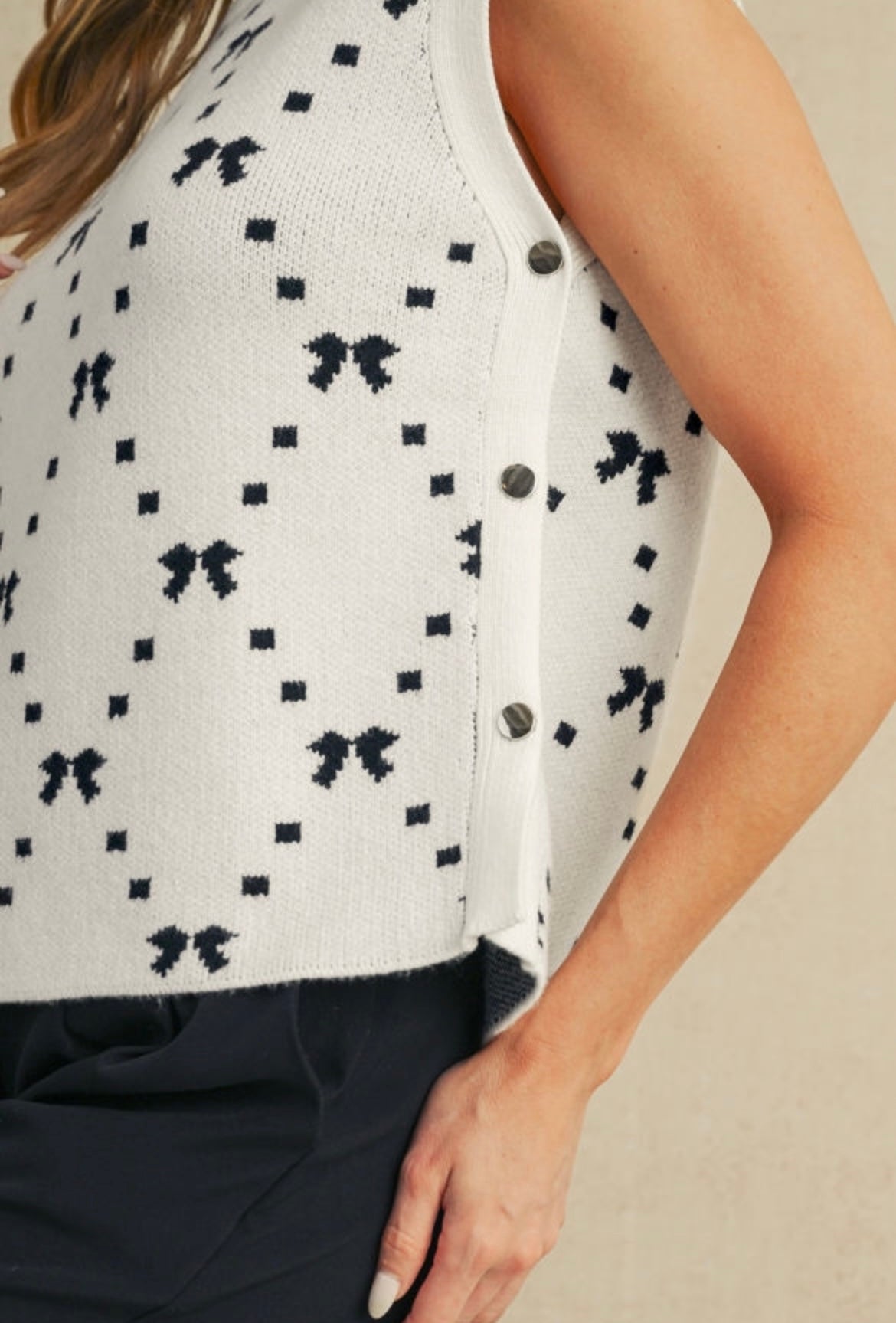 White Bow Pattern Buttoned Side Knit Top